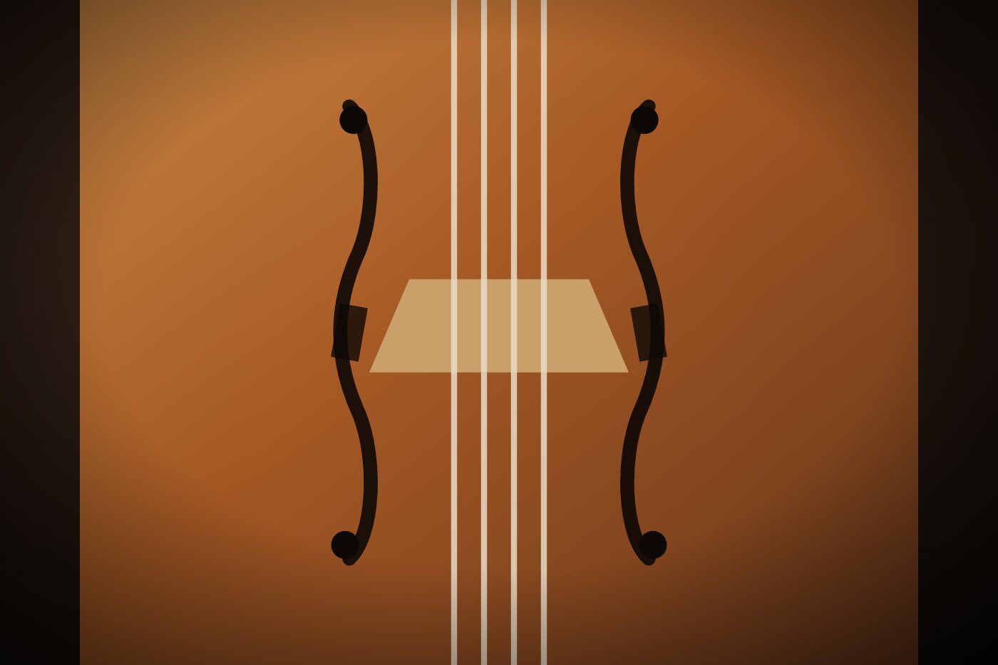 Violin bridge, f-holes and strings in close-up